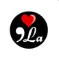 Round black pinback button with red heart and white cursive “La”