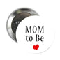 Mom to Be pinback button, white circle with MOM to Be text and red heart