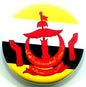 Brunei flag pinback with circular yellow design and red coat of arms