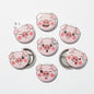 Set of six cartoon pig face pinback buttons, 1.25-inch round, with metal clips