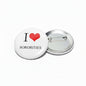 Round pinback button with 'I' and 'SORORITIES' text and red heart