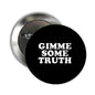 2.25-inch pinback badge with black face and white 'GIMME SOME TRUTH' text