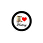 History button badge pin with black rim, white center, book, red heart, and “History” text