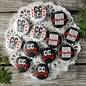 Round pinback badge set in tray with CC IS MY SPORT and RUN HARD designs, red/black