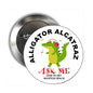2.25-inch circular pinback button with green alligator and 'Ask Me' text