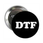1.25-inch DTF pinback button with black face and white DTF logo