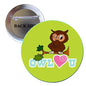 Round green owl pinback button with cartoon owl, pink heart, and OWL YOU text.
