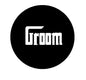 Round black groom pinback button with white 'Groom' lettering