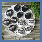 Set of round pinback button pins with black-and-white bowling graphics and “PLAY to WIN” text
