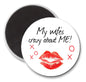 Round refrigerator magnet with 'My wife's crazy about ME!' text and red kiss lips.