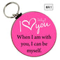 Pink round keychain with heart “Why? I love you” and “When I am with you, I can be myself.”