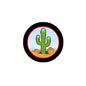 Round cactus desert pinback button with black border and green cactus on sandy ground