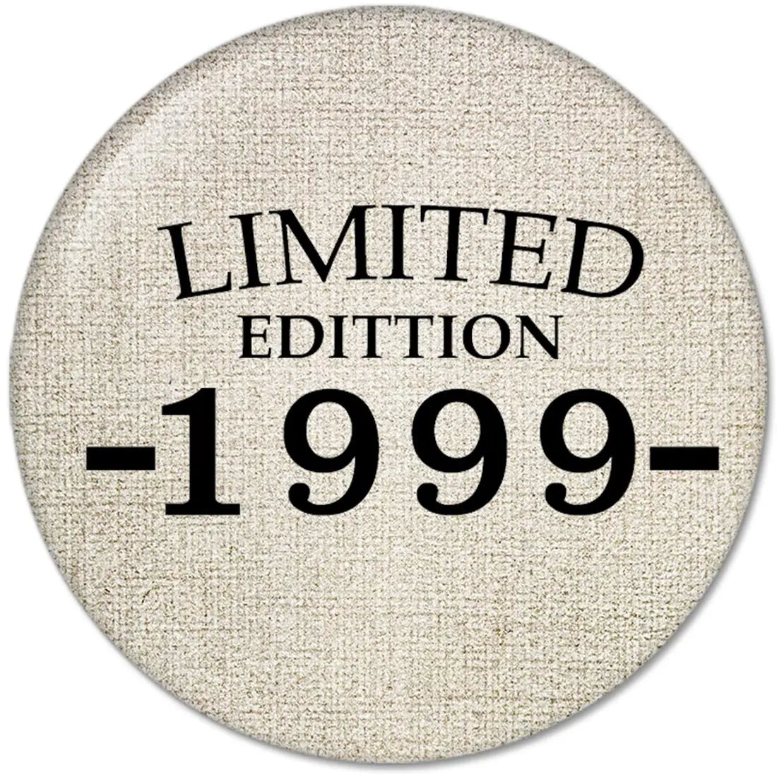 Round pinback button with beige textured face and black text: LIMITED EDITION 1999-
