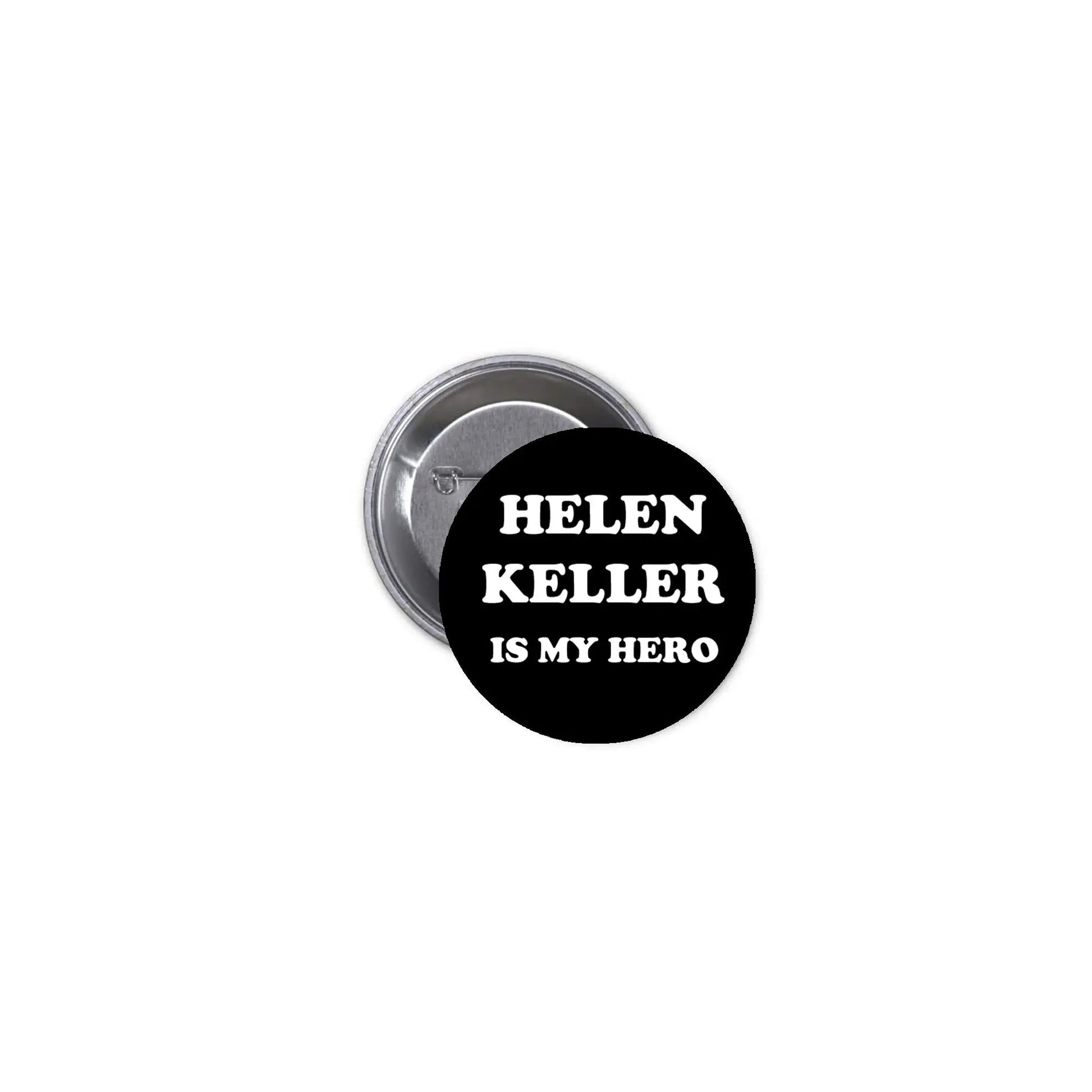 Round pinback button with black face and white 'HELEN KELLER IS MY HERO' text