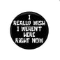 Black pinback badge with bold white quote: I REALLY WISH