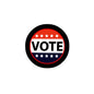 Vote campaign pinback button, circular black edge with red center and “VOTE” text
