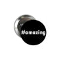 2.25-inch pinback badge with black face and white #amazing text