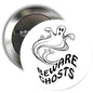 Round Halloween pinback button with Beware Ghosts ghost graphic and silver back.