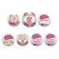 8-piece bachelorette pinback buttons, round white with pink text and floral accents