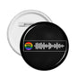 Round LGBT pin badge with black face, rainbow emblem and white soundwave bars