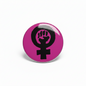 Feminist fist pinback button, pink round face with black raised hand symbol