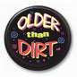 2.25-inch pinback button, black face with colorful “Older than Dirt” lettering.