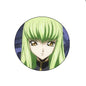 Round badge with anime-style girl illustration, green hair and dark outfit