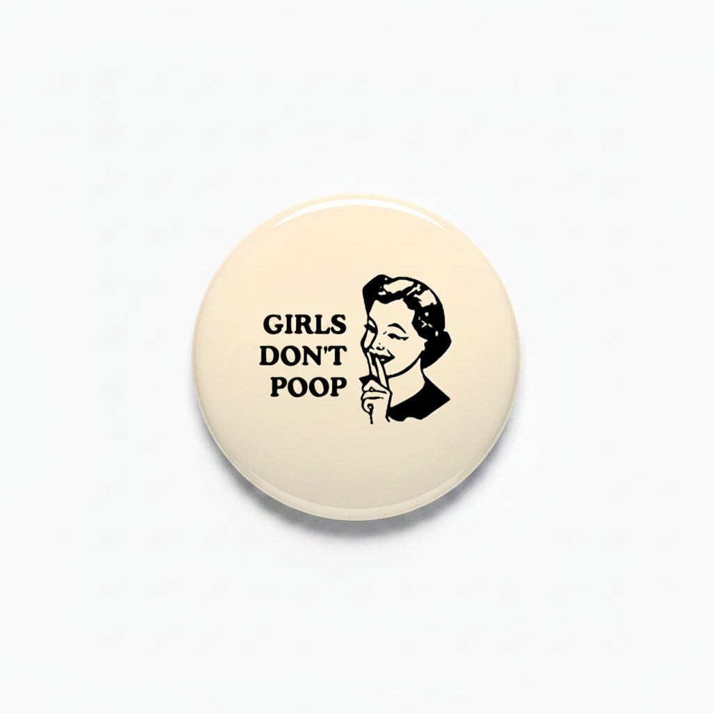 Round pinback button with “GIRLS DON’T POOP” graphic