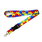 Puzzle-print lanyard strap with black buckle and silver key hook, multicolor