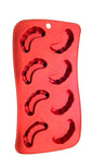 Red silicone ice cube tray with six fang-shaped cavities for Halloween treats