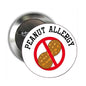 Peanut allergy pinback badge with crossed peanut icon and text, round metal backing