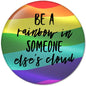 Rainbow pinback button with 'Be a rainbow' and 'someone else's cloud' text