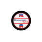 Round pinback button with black edge, white/red stripes, blue stars, 'Democrats Suck' text