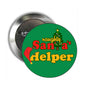 Green Santa's Helper pinback badge, round design with naughty text and tree icon