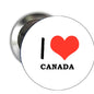 Round Canada button pin with red heart and I ♥ CANADA lettering