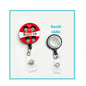 Felt retractable badge reel with round Beatles fan badge and clear badge holder clip