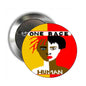 Round pinback button with split-face graphic and text “ONE RACE” and “HUMAN”