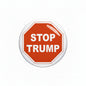 Round orange Stop Trump pinback button with white STOP TRUMP text