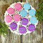 Set of round Yoga Goddess button pins with colorful designs, pinbacks visible