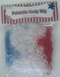 Patriotic curly wig with red, white, and blue curls in a sealed package