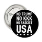 Round black pinback button with white text: NO TRUMP, NO KKK, NO FASCIST, USA