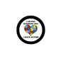 Autism heart pinback button, round black border with puzzle-heart and 'I AM NOT IGNORING YOU'