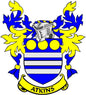 Atkins coat of arms pinback badge with blue and gold shield and ribbon banner