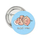 Light blue pinback brooch with cartoon baby face and "baby me!" text, round 2.25-inch badge