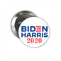 Round silver campaign pin with Biden Harris 2020 lettering on white face