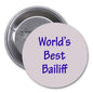 2.25-inch round pinback badge with 'World's Best Bailiff' in blue text