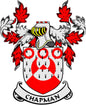 Chapman coat of arms pinback: red and white shield with ornate ribbon text CHAPMAN