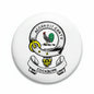 Round family crest coat-of-arms magnet with bird and gold emblem on white background