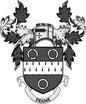 Family crest pinback with black shield, cross tower, and banner reading Deane