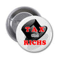 1.25-inch round pinback button with black design reading TAX the RICHs